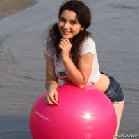 Cute angel on the beach