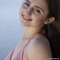 Cute girl on the shore