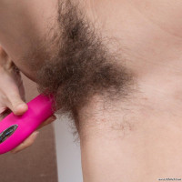 Efina masturbates with her pink dildo