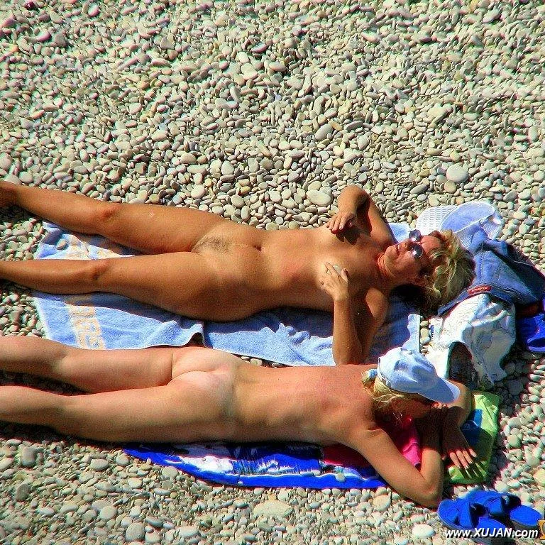 Two hot busty Milfs relax in the sun - Photo #92466