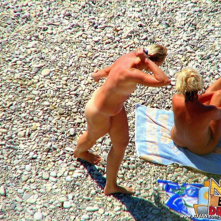 Two hot busty Milfs relax in the sun - Photo #92475