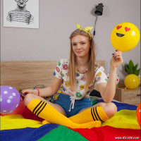 Blonde teen playing alone