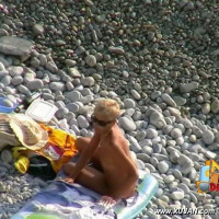 Fine blonde model walks naked teasing young boys