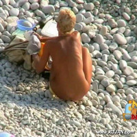 Fine blonde model walks naked teasing young boys