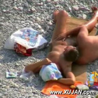 Hot young couple teases each other in public