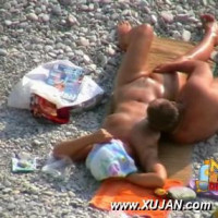 Hot young couple teases each other in public