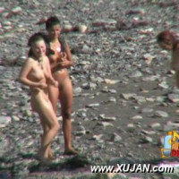 Wonderful models are exploring the beach together naked
