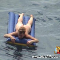 Horny husband likes watching his naked wife swimming