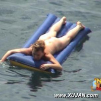 Horny husband likes watching his naked wife swimming