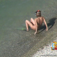 Young college blonde likes to go under the water