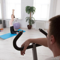 Trainer makes cutie work out by fingering her tight asshole