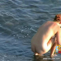 Mature redhead takes her clothes off in public