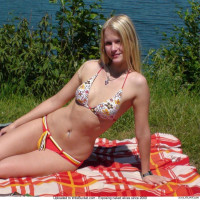 Just my wife fully naked on the river beach