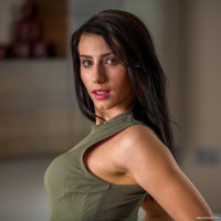 Stunning babe Nelly Kent on her knees while spreading her ass