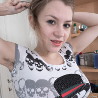 Kira Tomson masturbates in her bathroom by the tub