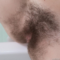Kira Tomson masturbates in her bathroom by the tub