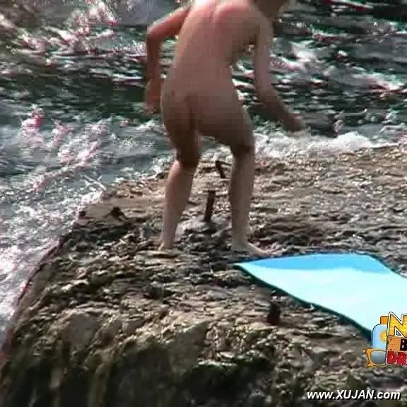Busty blonde enjoys swimming in big waves - Photo #168480