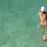Hot stunning naked brunette goes for a swim workout