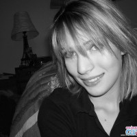 Beautiful young blonde gets ready to masturbate