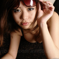 Asian Rena takes animal print bra off to release her big boobies