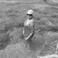 She loves to show her firm tits on the beach