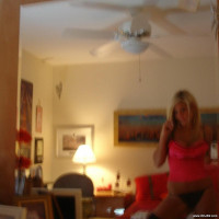Awesome babe with big tits having fun with camera