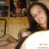 Naked girlfriends posing for the camera