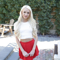 Skinny blonde goes down on all fours in front of a big dick