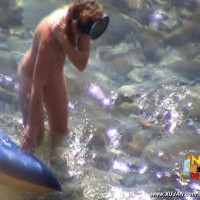 Sweet brunette simply loves getting wet everywhere