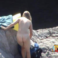 Gorgeous blonde sunbathing her big natural tits
