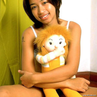 Young asian spreads her tight pussy