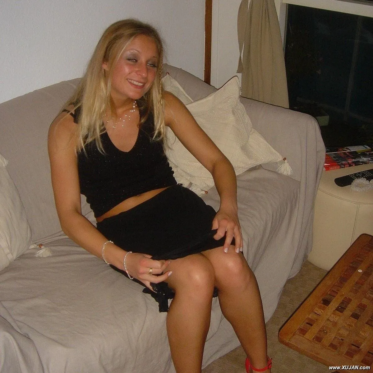 Blueeyed blonde pulls panties down, shows her pussy - Photo #211271