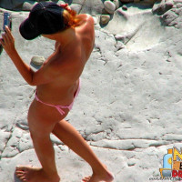 Sexy naked girls enjoing hot sun at the beach