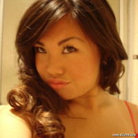 Asian babe showing her body spreading pussy