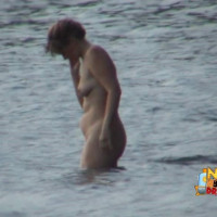 Lovely brunette with big tits likes to get wet