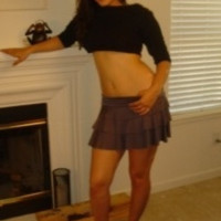 Sunny Leone improvises strip show by the fireplace when the camera turns on