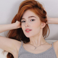 Stunning ginger Jia Lissa sheds panties and plays with her trimmed pussy
