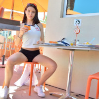 Lana Rhoades posing while wearing sexy shorts during a hike