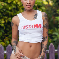 Honey Gold is a young Asian porn actress with firstclass body and tattoos