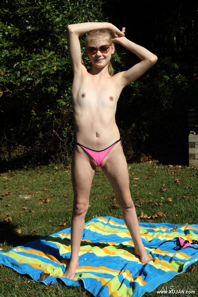 Tiny titted Hannah Hays in bikini enjoying vaginal insertion in the sunshine - Photo #297952