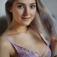 Young beauty Eva Elfie works her juicy ass while removing sensual lingerie