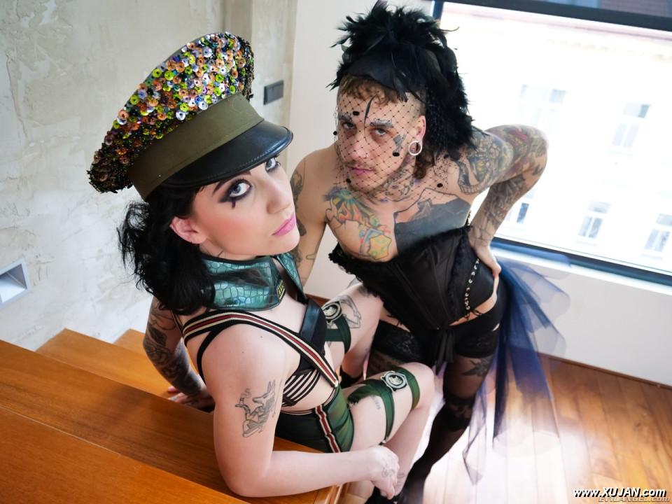 Tattooed brunette Charlotte Sartre is joined by crossdressing sissy Bo Sinn - Photo #306811
