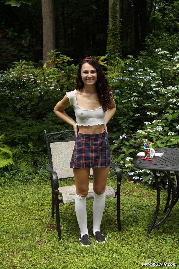 Young brunette Liz Jordan wears knee socks while sticking sharpies in her cunt - Photo #309636