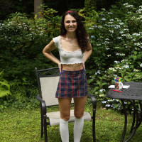 Young brunette Liz Jordan wears knee socks while sticking sharpies in her cunt