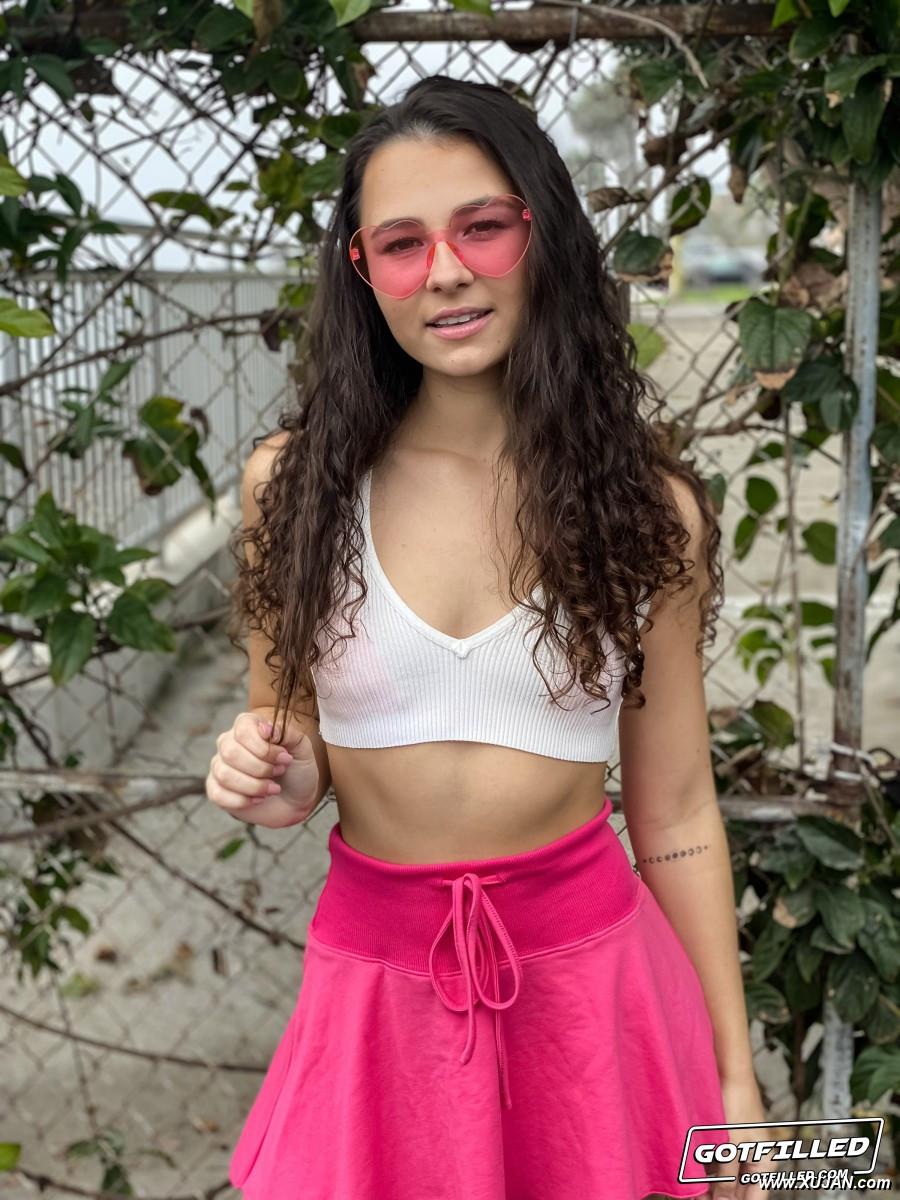 Young brunette Liz Jordan models a bikini at a marina before sex at home - Photo #310021