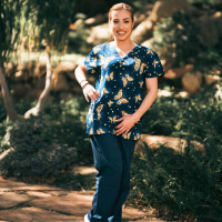 Pretty nurse Spencer Bradley shares a lesbian kiss with Liz Jordan