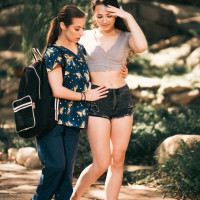 Pretty nurse Spencer Bradley shares a lesbian kiss with Liz Jordan