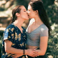 Pretty nurse Spencer Bradley shares a lesbian kiss with Liz Jordan