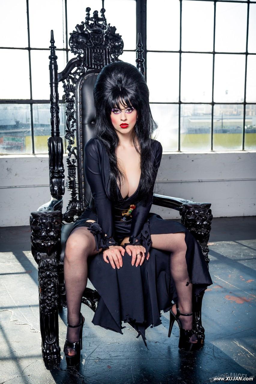 Dark haired female Larkin Love exposes her big boobs in fetish attire - Photo #313303