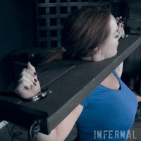 Thick redhead Summer Hart is masturbated by London River while in bondage